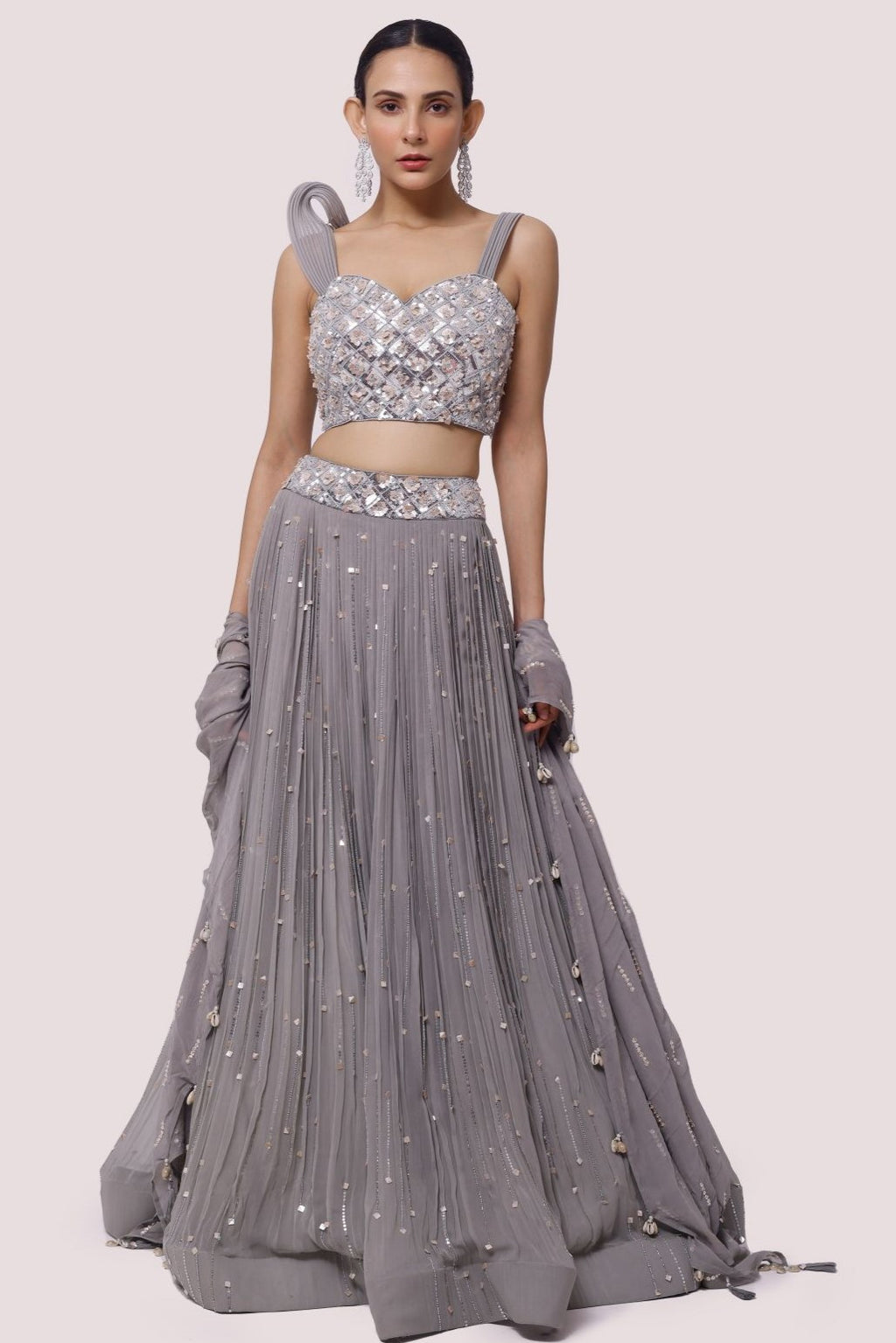 Buy grey hand embroidered contemporary georgette lehenga online in USA. Dazzle on weddings and special occasions with exquisite designer lehengas, Anarkali suit, sharara suit, Indowestern outfits, bridal lehengas from Pure Elegance Indian clothing store in the USA. -full view