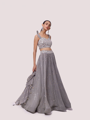 Buy grey hand embroidered contemporary georgette lehenga online in USA. Dazzle on weddings and special occasions with exquisite designer lehengas, Anarkali suit, sharara suit, Indowestern outfits, bridal lehengas from Pure Elegance Indian clothing store in the USA. -lehenga