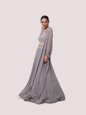 Buy grey hand embroidered contemporary georgette lehenga online in USA. Dazzle on weddings and special occasions with exquisite designer lehengas, Anarkali suit, sharara suit, Indowestern outfits, bridal lehengas from Pure Elegance Indian clothing store in the USA. -side