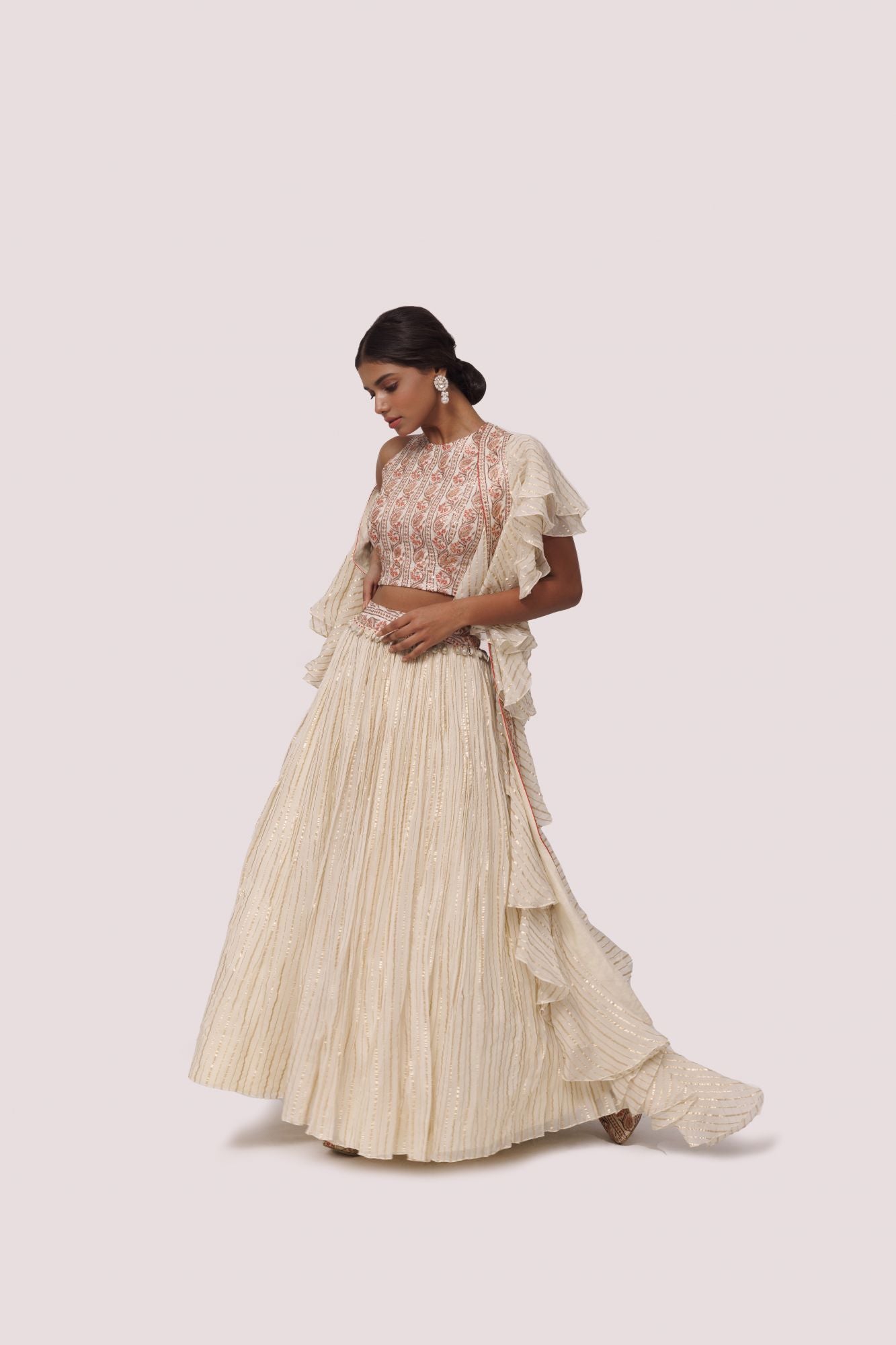Shop beautiful off-white printed silk and organza lehenga online in USA with aari work. Dazzle on weddings and special occasions with exquisite designer lehengas, Anarkali suit, sharara suit, Indowestern outfits, bridal lehengas from Pure Elegance Indian clothing store in the USA. -lehenga