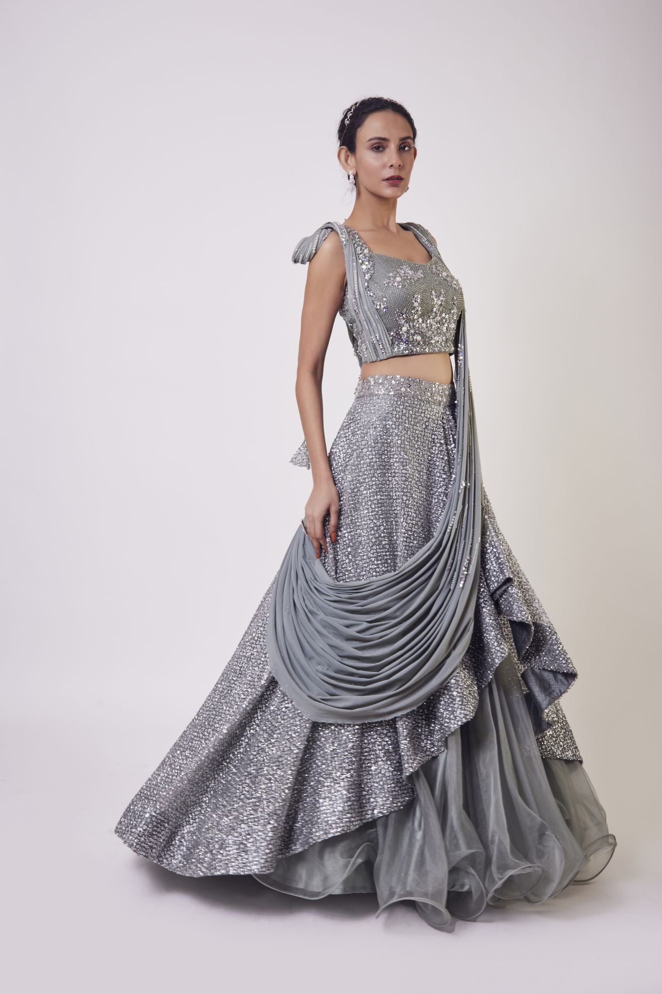 Shop dusky blue satin and organza contemporary lehenga online in USA. Dazzle on weddings and special occasions with exquisite designer lehengas, Anarkali suit, sharara suit, Indowestern outfits, bridal lehengas from Pure Elegance Indian clothing store in the USA. -side