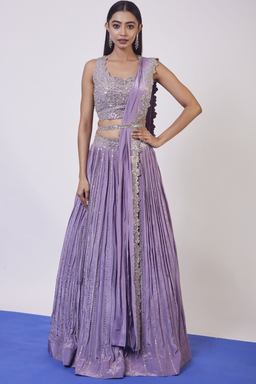 Buy lilac mirror work crepe lehenga online in USA with dupatta. Dazzle on weddings and special occasions with exquisite designer lehengas, Anarkali suit, sharara suit, Indowestern outfits, bridal lehengas from Pure Elegance Indian clothing store in the USA. -full view