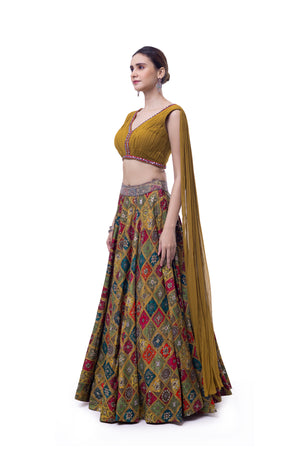 Shop mustard georgette silk skirt online in USA with pleated top. Dazzle on weddings and special occasions with exquisite designer lehengas, Anarkali suit, sharara suit, Indowestern outfits, bridal lehengas from Pure Elegance Indian clothing store in the USA. -skirt