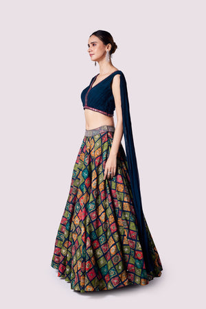 Buy blue silk skirt online in USA with georgette pleated top. Shop the best and latest designs in embroidered sarees, designer sarees, Anarkali suit, lehengas, sharara suits for weddings and special occasions from Pure Elegance Indian fashion store in USA.-side