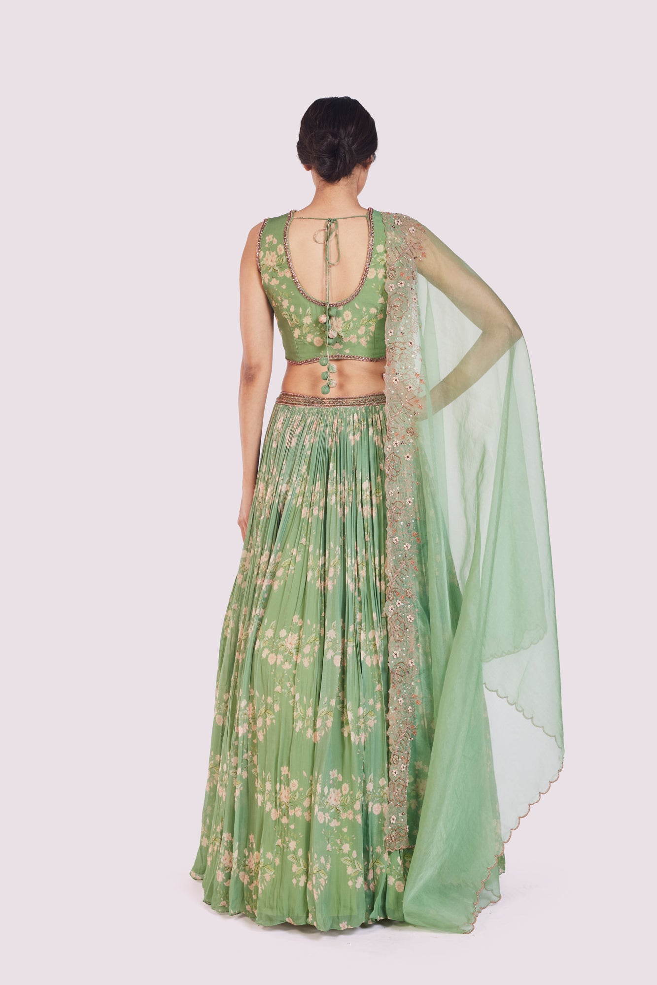 Buy sea green printed embellished georgette lehenga online in USA. Shop the best and latest designs in embroidered sarees, designer sarees, Anarkali suit, lehengas, sharara suits for weddings and special occasions from Pure Elegance Indian fashion store in USA.-back
