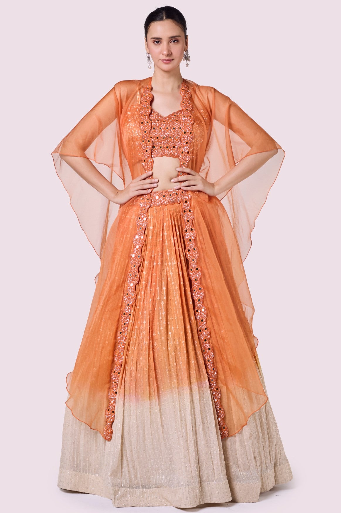 Shop beautiful orange embellished chikan lehenga online in USA with dupatta. Shop the best and latest designs in embroidered sarees, designer sarees, Anarkali suit, lehengas, sharara suits for weddings and special occasions from Pure Elegance Indian fashion store in USA.-full view