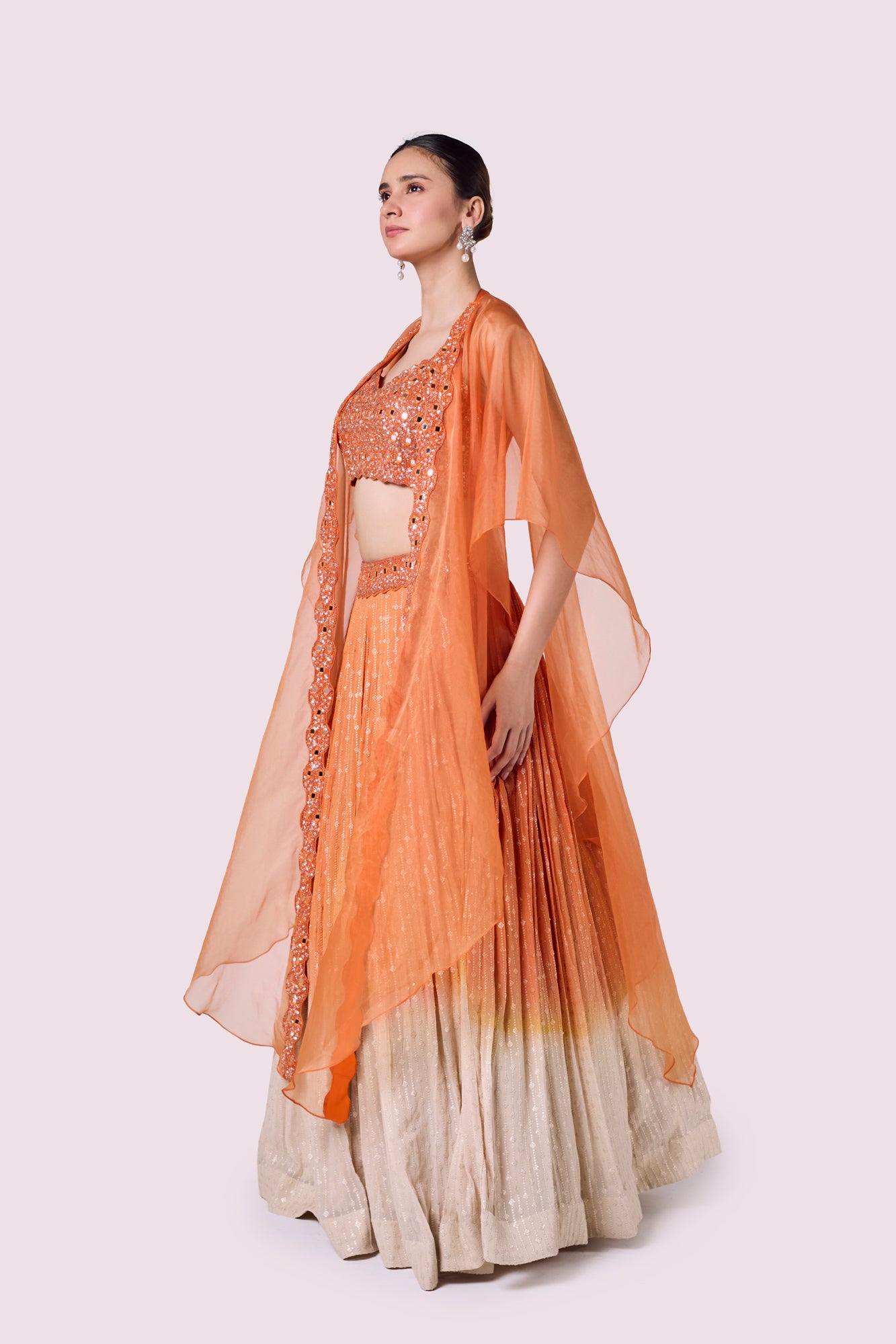 Shop beautiful orange embellished chikan lehenga online in USA with dupatta. Shop the best and latest designs in embroidered sarees, designer sarees, Anarkali suit, lehengas, sharara suits for weddings and special occasions from Pure Elegance Indian fashion store in USA.-lehenga