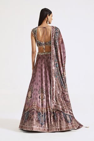 Shop onion pink printed and embroidered velvet lehenga online in USA. Shop the best and latest designs in embroidered sarees, designer sarees, Anarkali suit, lehengas, sharara suits for weddings and special occasions from Pure Elegance Indian fashion store in USA.-back