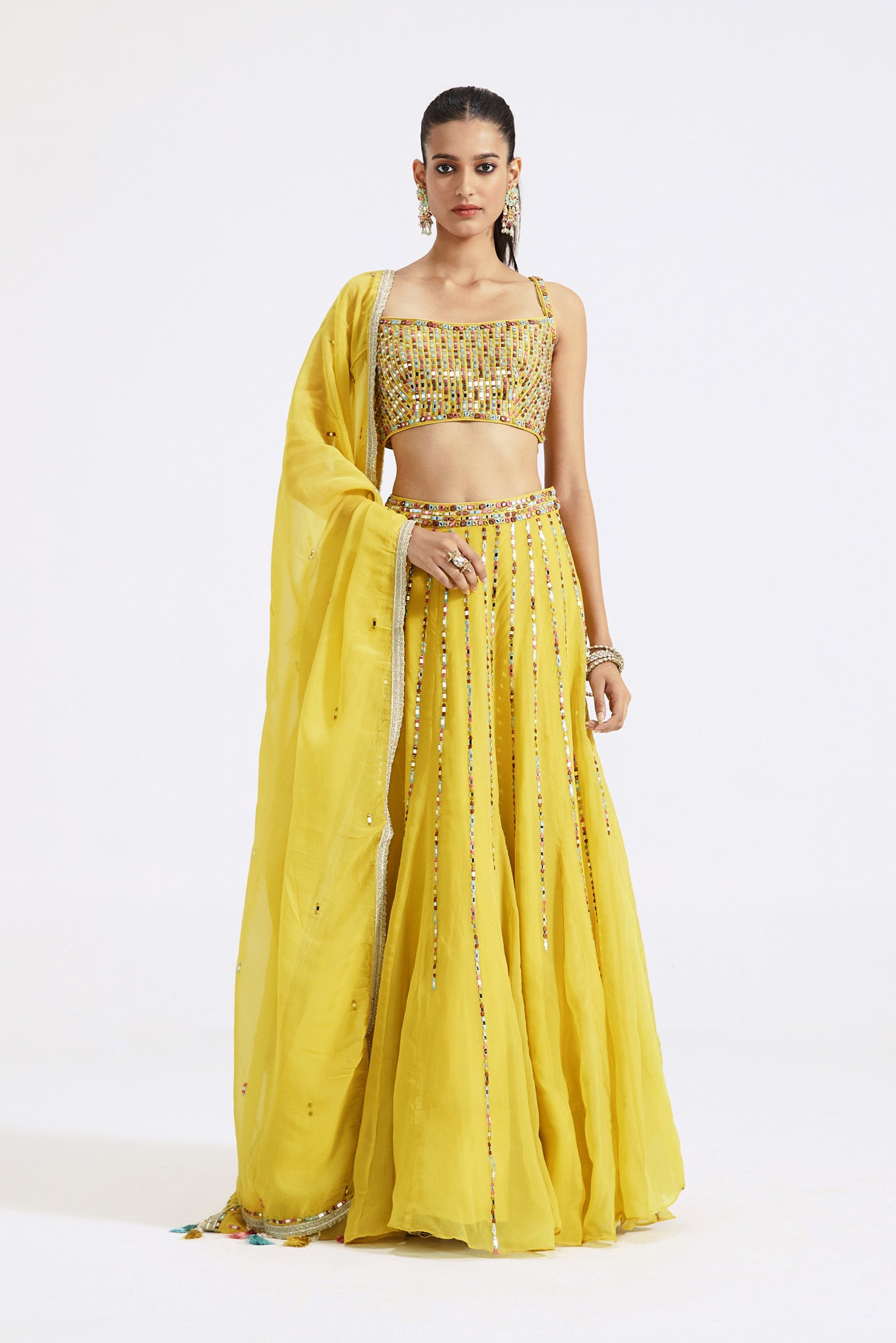 Buy stunning lemon yellow embellished organza lehenga online in USA with dupatta. Shop the best and latest designs in embroidered sarees, designer sarees, Anarkali suit, lehengas, sharara suits for weddings and special occasions from Pure Elegance Indian fashion store in USA.-full view