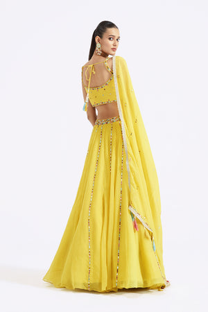 Buy stunning lemon yellow embellished organza lehenga online in USA with dupatta. Shop the best and latest designs in embroidered sarees, designer sarees, Anarkali suit, lehengas, sharara suits for weddings and special occasions from Pure Elegance Indian fashion store in USA.-back