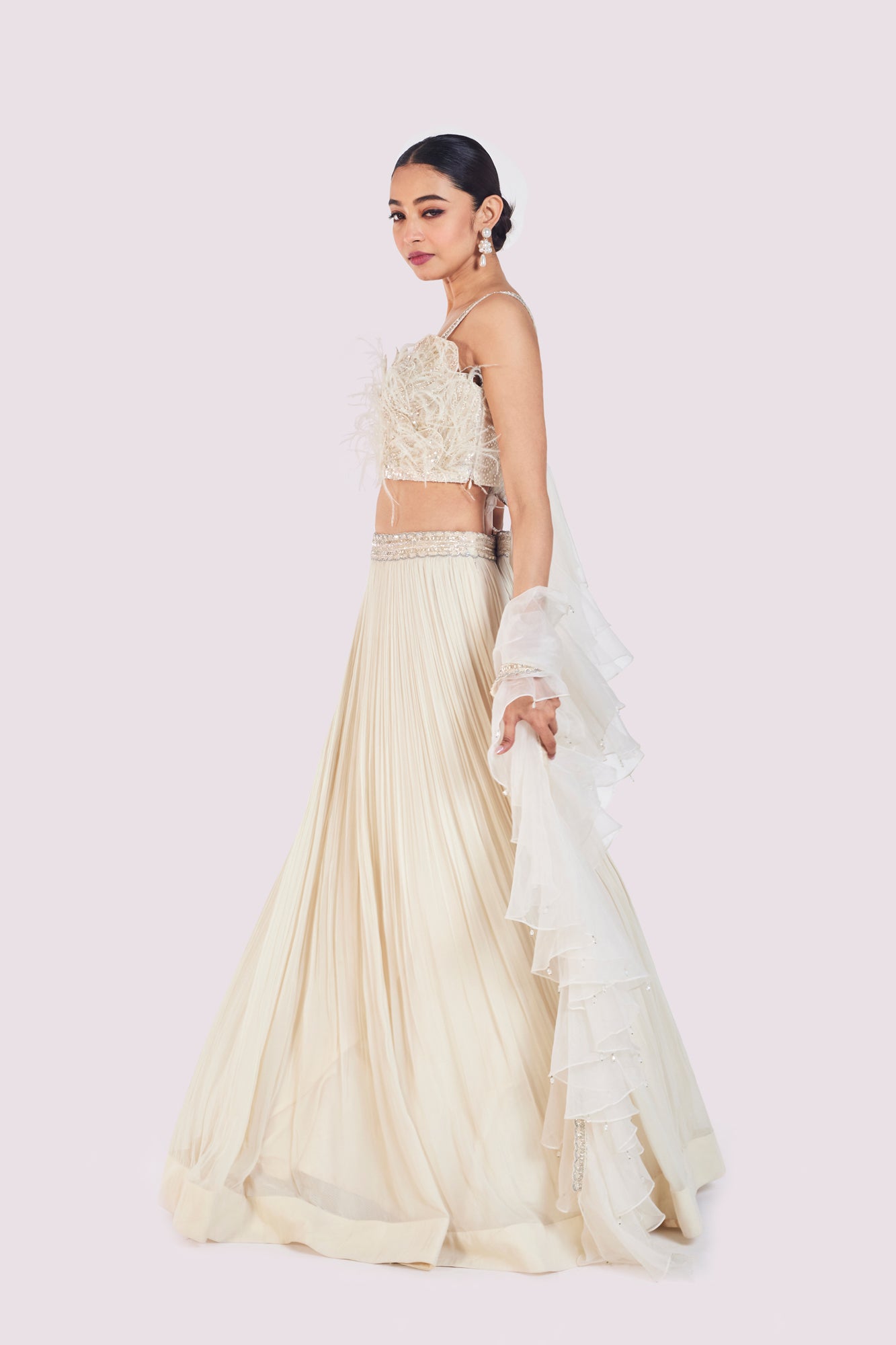 Shop ivory embroidered designer net lehenga online in USA with dupatta. Shop the best and latest designs in embroidered sarees, designer sarees, Anarkali suit, lehengas, sharara suits for weddings and special occasions from Pure Elegance Indian fashion store in USA.-lehenga