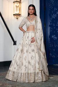 Shop ivory embroidered organza lehenga online in USA with dupatta. Shop the best and latest designs in embroidered sarees, designer sarees, Anarkali suit, lehengas, sharara suits for weddings and special occasions from Pure Elegance Indian fashion store in USA.-full view