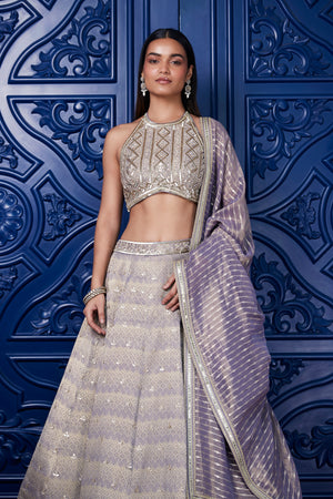 Buy mauve embroidered tissue lehenga online in USA with dupatta. Shop the best and latest designs in embroidered sarees, designer sarees, Anarkali suit, lehengas, sharara suits for weddings and special occasions from Pure Elegance Indian fashion store in USA.-closeup