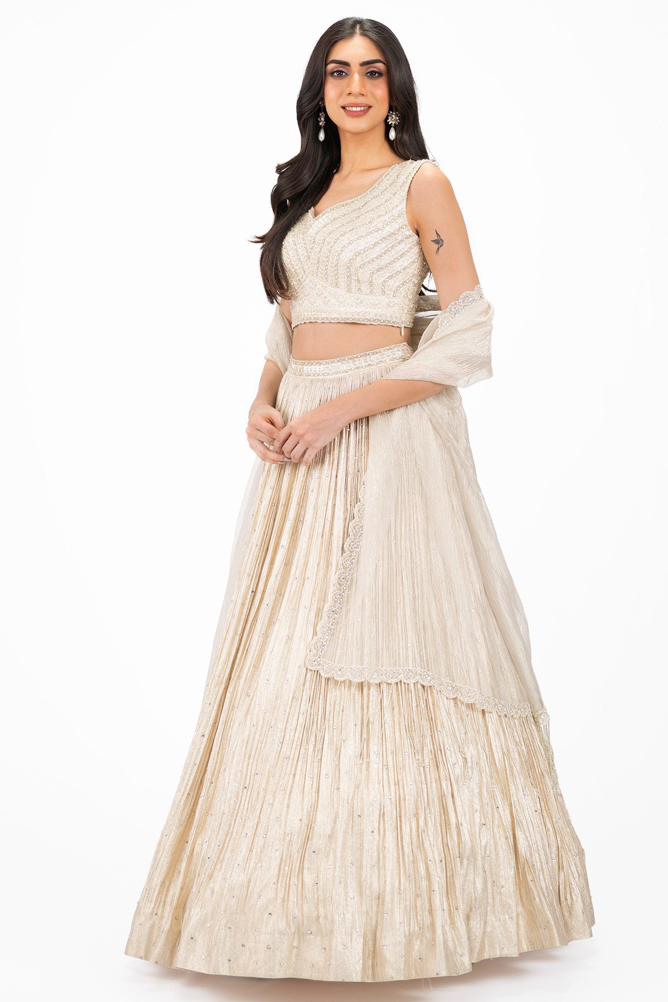 Shop cream embellished Bemberg Russian lehenga online in USA. Shop the best and latest designs in embroidered sarees, designer sarees, Anarkali suit, lehengas, sharara suits for weddings and special occasions from Pure Elegance Indian fashion store in USA.-side