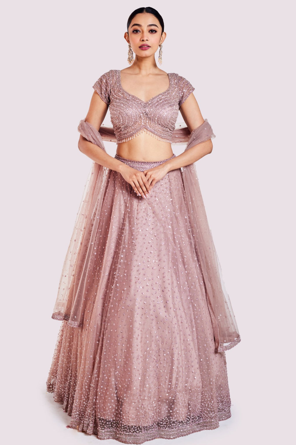 Buy beautiful onion pink embroidered net lehenga online in USA with dupatta. Shop the best and latest designs in embroidered sarees, designer sarees, Anarkali suit, lehengas, sharara suits for weddings and special occasions from Pure Elegance Indian fashion store in USA.-full view