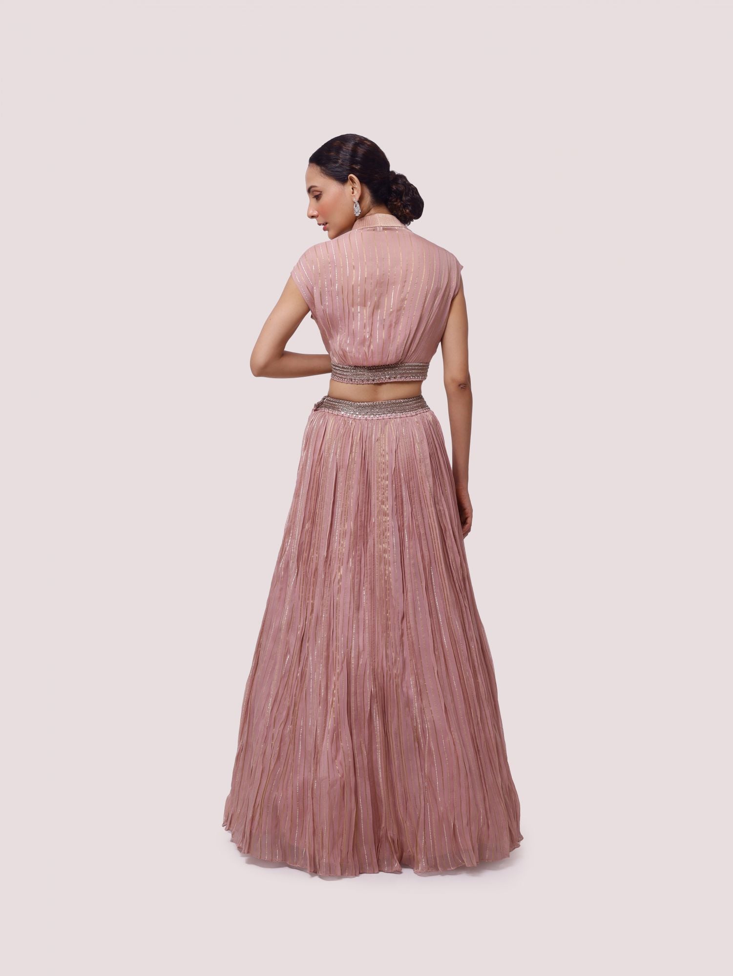 Shop dusty pink embroidered organza skirt set online in USA. Dazzle on weddings and special occasions with exquisite designer lehengas, Anarkali suit, sharara suit, Indowestern outfits, bridal lehengas from Pure Elegance Indian clothing store in the USA. -back