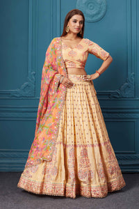 Shop this gorgeous mustard embroidered silk lehenga. It comes with a stunning floral dupatta. Be an epitome of Indian fashion in exquisite Indian designer lehengas, embroidered sarees, and Anarkali suits available at our exclusive Indian fashion store in the USA and also on our online store. Shop now.