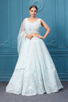 Shop for different occasions a light blue lehenga with silver embroidery sleeveless blouse. Dazzle on weddings and special occasions with exquisite Indian designer dresses, sharara suits, Anarkali suits, bridal lehengas, and sharara suits from Pure Elegance Indian clothing store in the USA. Shop online from Pure Elegance.