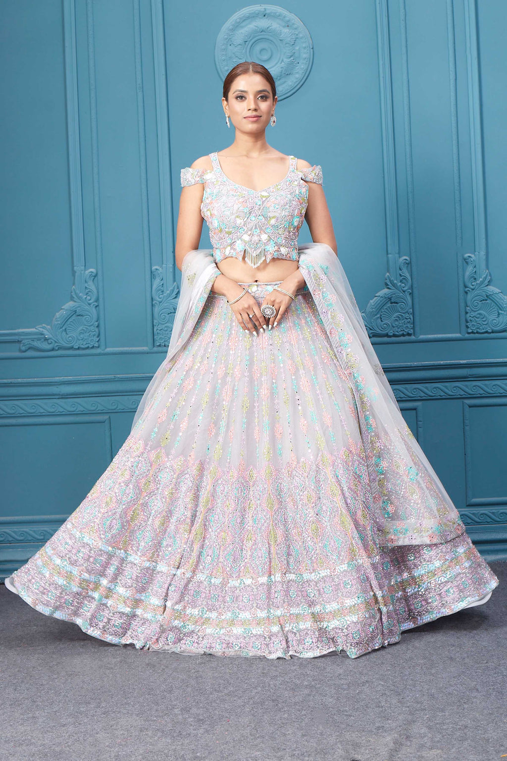 Buy this light pink lehenga with heavy multicolor sequin & mirror embroidery. Dazzle on weddings and special occasions with exquisite Indian designer dresses, sharara suits, Anarkali suits, bridal lehengas, and sharara suits from Pure Elegance Indian clothing store in the USA. Shop online from Pure Elegance.