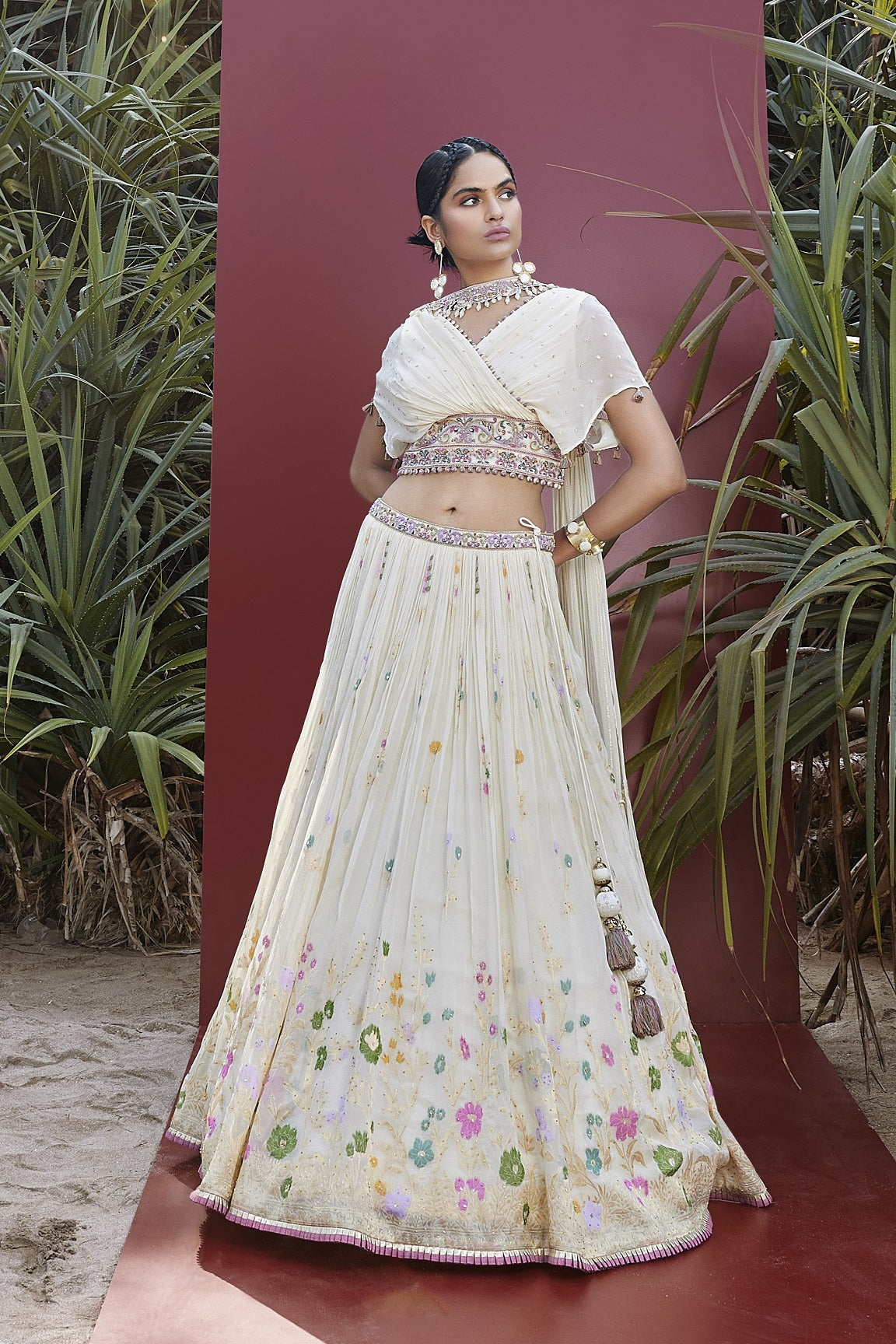 Shop off-white embroidered contemporary georgette lehenga online in USA with dupatta. Be the star of the occasions in designer lehengas, embroidered suits, Anarkali dress, designer gowns, sharara suits, Bollywood sarees from Pure Elegance Indian fashion store in USA.-lehenga
