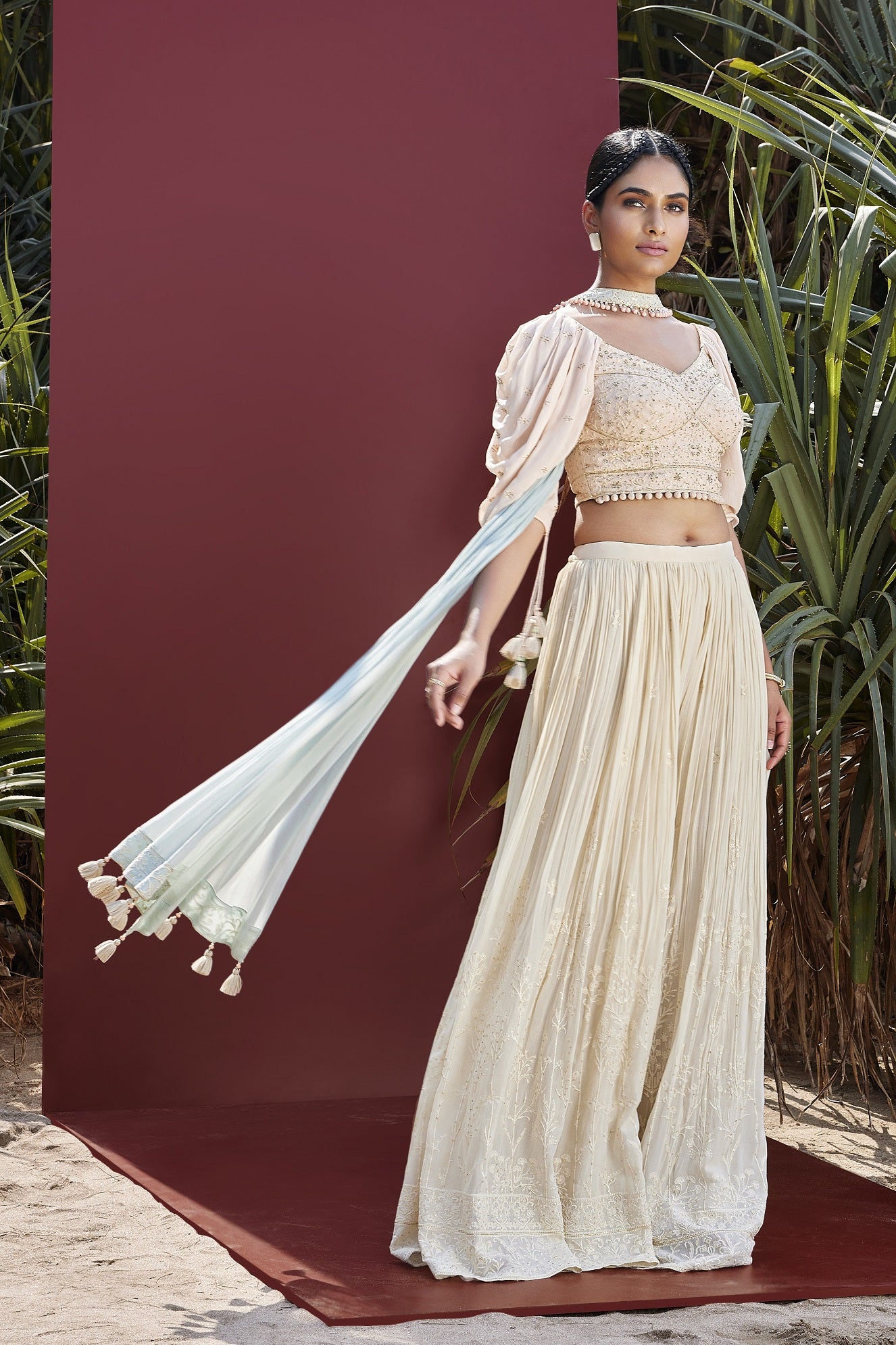 Shop cream embroidered crop top with palazzo online in USA and dupatta. Be the star of the occasions in designer lehengas, embroidered suits, Anarkali dress, designer gowns, sharara suits, Bollywood sarIs from Pure Elegance Indian fashion store in USA.-full view