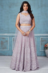 Buy lilac heavy embroidery georgette lehenga online in USA with dupatta. Look royal on special occasions in exquisite designer lehengas, pure silk sarees, handloom sarees, Bollywood sarees, Anarkali suits, Banarasi sarees, organza sarees from Pure Elegance Indian saree store in USA.-full view