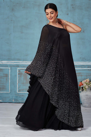 Shop stunning black embroidered crepe silk top online in USA with skirt. Look royal on special occasions in exquisite designer lehengas, pure silk sarees, handloom sarees, Bollywood sarees, Anarkali suits, Banarasi sarees, organza sarees from Pure Elegance Indian saree store in USA.-side