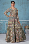 Buy beautiful olive green printed and embroidered georgette Anarkali suit online in USA. Look royal on special occasions in exquisite designer lehengas, pure silk sarees, handloom sarees, Bollywood sarees, Anarkali suits, Banarasi sarees, organza sarees from Pure Elegance Indian saree store in USA.-full view