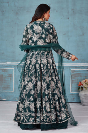 Buy dark green embroidered lehenga online in USA with jacket. Look royal on special occasions in exquisite designer lehengas, pure silk sarees, handloom sarees, Bollywood sarees, Anarkali suits, Banarasi sarees, organza sarees from Pure Elegance Indian saree store in USA.-back