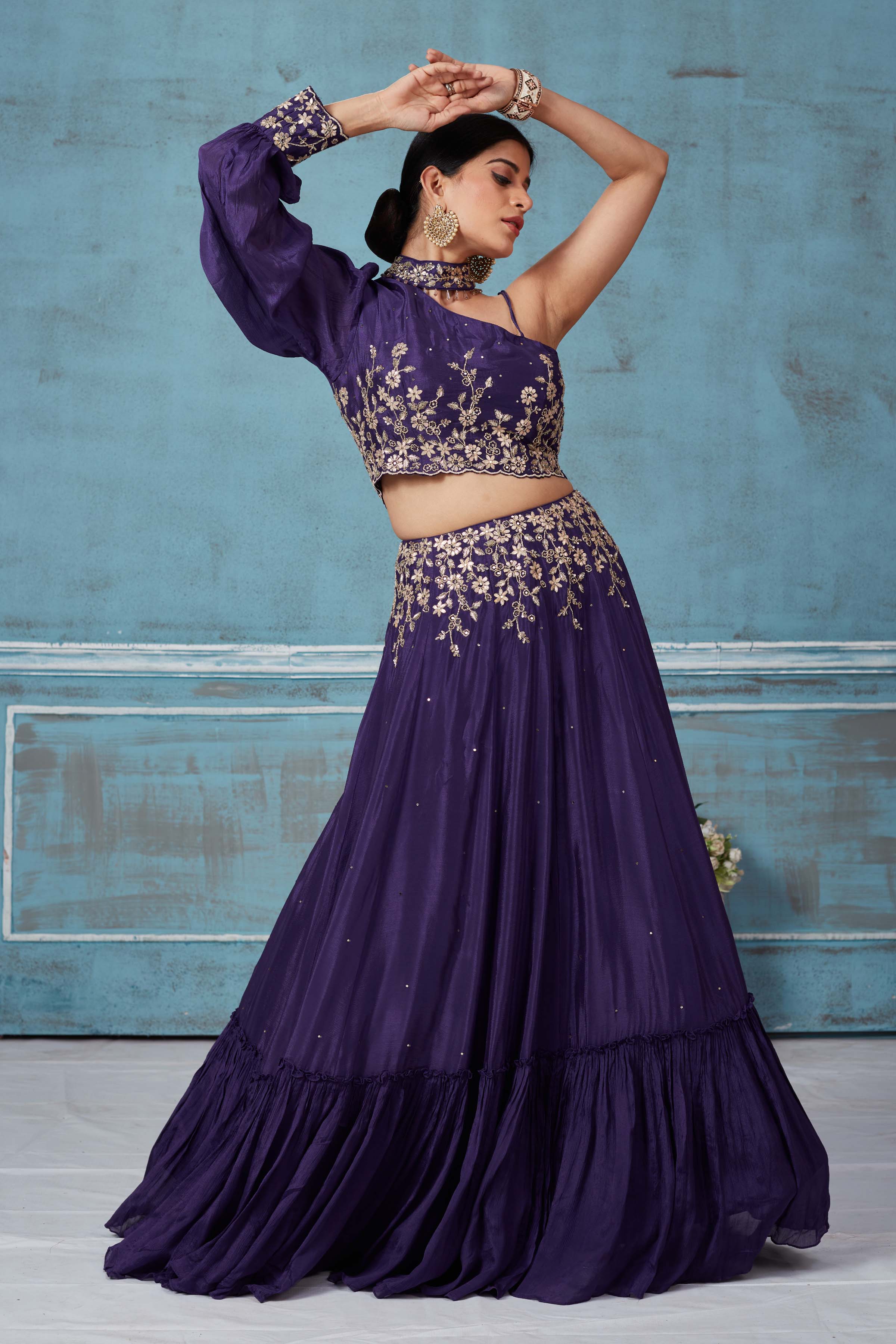 Shop purple georgette embroidered contemporary skirt set online in USA. Look royal on special occasions in exquisite designer lehengas, pure silk sarees, handloom sarees, Bollywood sarees, Anarkali suits, Banarasi sarees, organza sarees from Pure Elegance Indian saree store in USA.-front