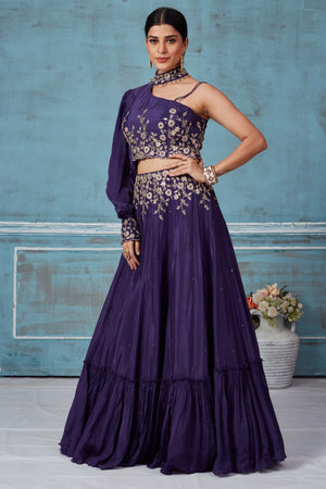Shop purple georgette embroidered contemporary skirt set online in USA. Look royal on special occasions in exquisite designer lehengas, pure silk sarees, handloom sarees, Bollywood sarees, Anarkali suits, Banarasi sarees, organza sarees from Pure Elegance Indian saree store in USA.-side