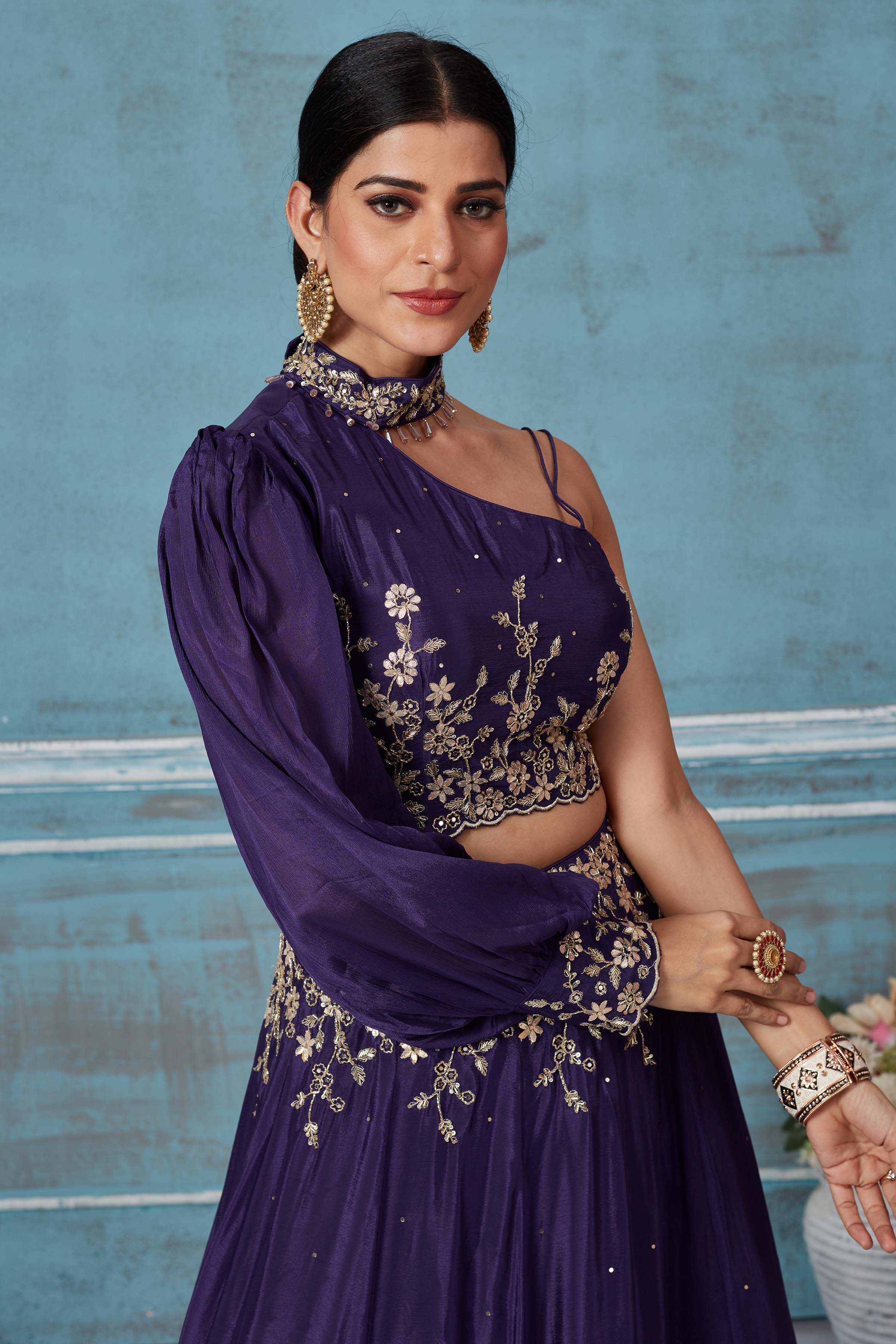 Shop purple georgette embroidered contemporary skirt set online in USA. Look royal on special occasions in exquisite designer lehengas, pure silk sarees, handloom sarees, Bollywood sarees, Anarkali suits, Banarasi sarees, organza sarees from Pure Elegance Indian saree store in USA.-closeup