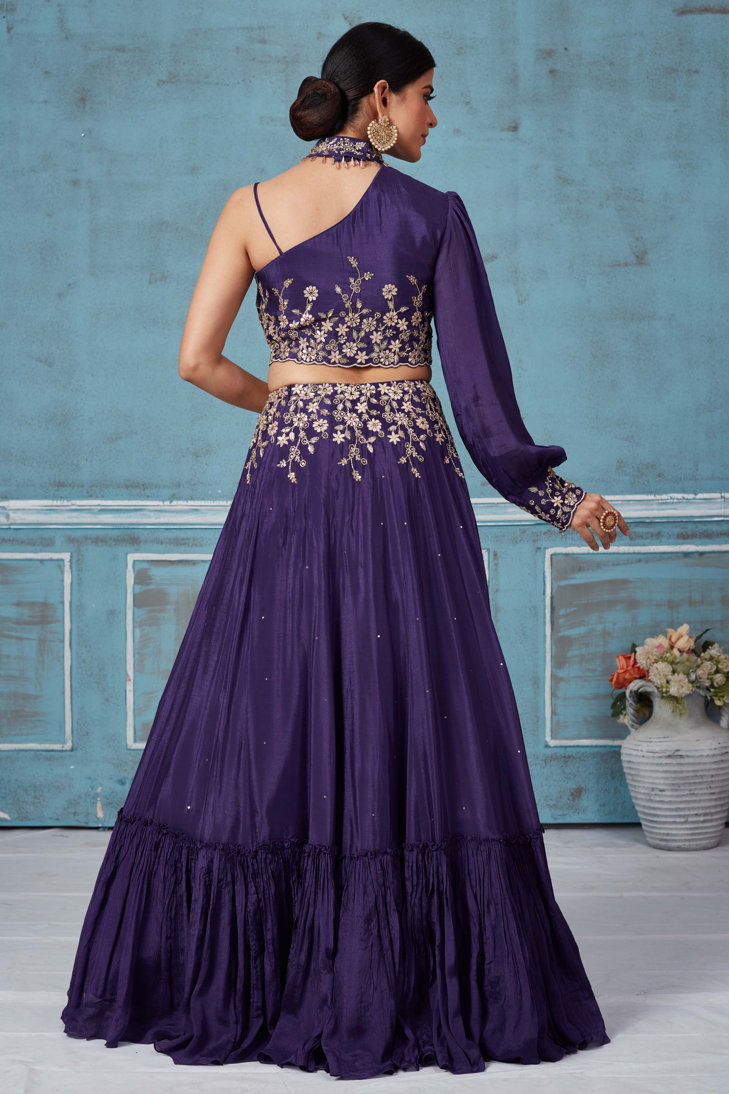 Shop purple georgette embroidered contemporary skirt set online in USA. Look royal on special occasions in exquisite designer lehengas, pure silk sarees, handloom sarees, Bollywood sarees, Anarkali suits, Banarasi sarees, organza sarees from Pure Elegance Indian saree store in USA.-back