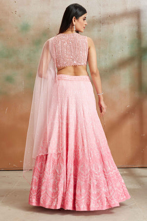Shop ombre pink Lucknowi georgette lehenga online in USA with dupatta. Look your best on festive occasions in latest designer saris, pure silk sarees, Kanjivaram silk sarees, handwoven saris, tussar silk sarees, embroidered saris from Pure Elegance Indian clothing store in USA.-back