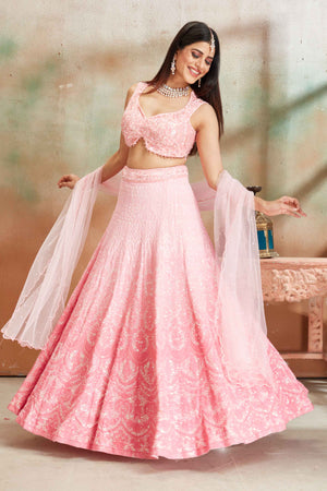 Shop ombre pink Lucknowi georgette lehenga online in USA with dupatta. Look your best on festive occasions in latest designer saris, pure silk sarees, Kanjivaram silk sarees, handwoven saris, tussar silk sarees, embroidered saris from Pure Elegance Indian clothing store in USA.-side