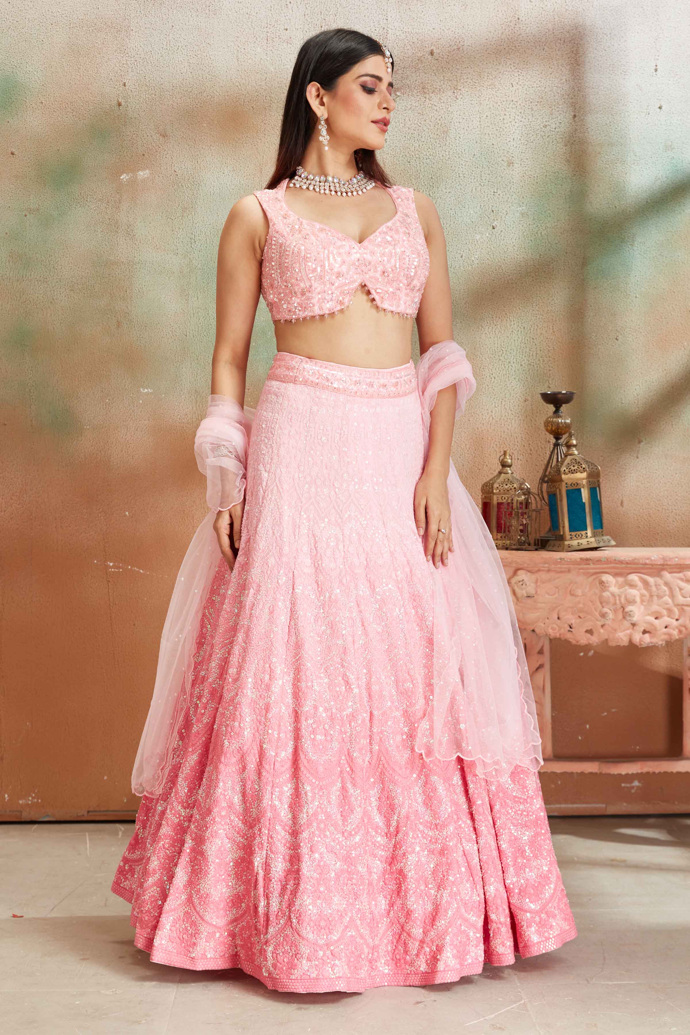 Shop ombre pink Lucknowi georgette lehenga online in USA with dupatta. Look your best on festive occasions in latest designer saris, pure silk sarees, Kanjivaram silk sarees, handwoven saris, tussar silk sarees, embroidered saris from Pure Elegance Indian clothing store in USA.-lehenga