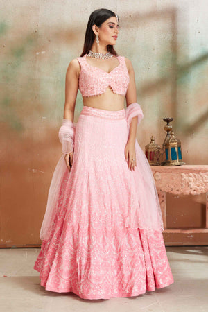 Shop ombre pink Lucknowi georgette lehenga online in USA with dupatta. Look your best on festive occasions in latest designer saris, pure silk sarees, Kanjivaram silk sarees, handwoven saris, tussar silk sarees, embroidered saris from Pure Elegance Indian clothing store in USA.-lehenga