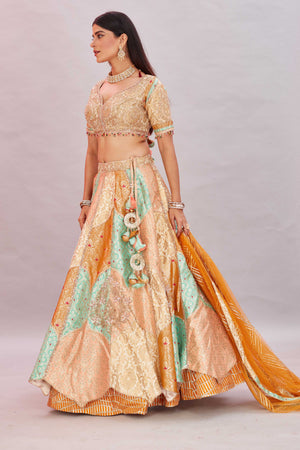 Buy multicolor peach embroidered silk lehenga sari online in USA with dupatta. Look your best on festive occasions in latest designer saris, pure silk sarees, Kanjivaram silk sarees, handwoven saris, tussar silk sarees, embroidered saris from Pure Elegance Indian clothing store in USA.-side