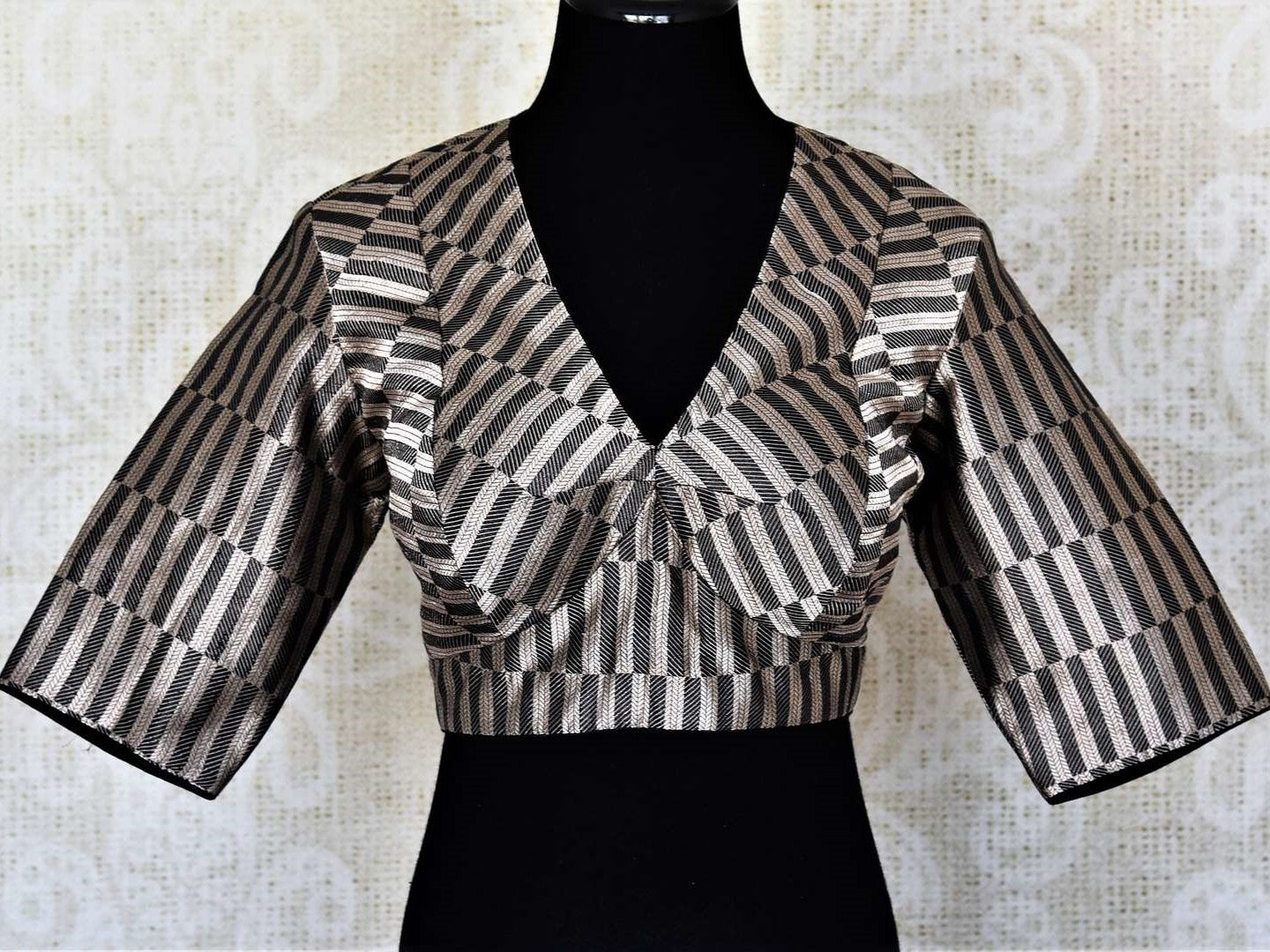 Shop stunning silver and grey stripes silk saree blouse online in USA. Add an elegant touch to your ethnic sarees with beautiful designer blouses, readymade saree blouses, Banarasi blouses, choli-cut blouses from Pure Elegance Indian fashion store in USA.-front