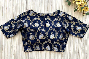 Shop navy blue Banarasi blouse online in USA with minakari and zari work. Elevate your saree style with exquisite readymade sari blouses, embroidered saree blouses, Banarasi sari blouse, designer saree blouse, choli-cut blouses, corset blouses from Pure Elegance Indian fashion store in USA.-back