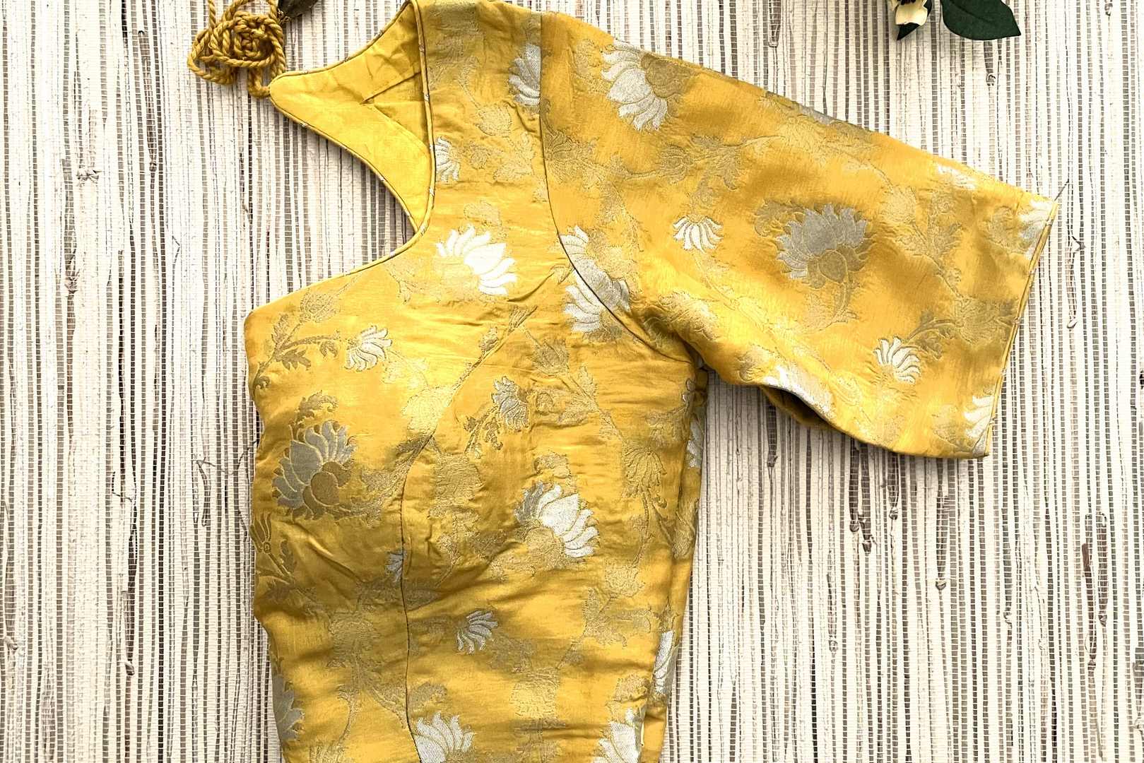 Shop stunning yellow Banarasi saree blouse online in USA. Elevate your saree style with exquisite readymade sari blouses, embroidered saree blouses, Banarasi sari blouse, designer saree blouse, choli-cut blouses, corset blouses from Pure Elegance Indian fashion store in USA.-side