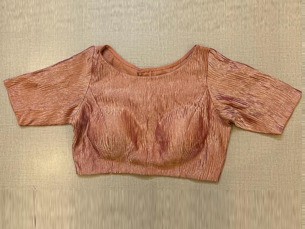 Shop copper crushed tissue saree blouse online in USA with elbow sleeves. Pair your sarees with elegant sarees blouses, designer blouses, embroidered blouses, choli-cut blouses, bridal blouses, cotton saree blouses for a beautiful ethnic look. Shop from Pure Elegance Indian saree store in USA.-front