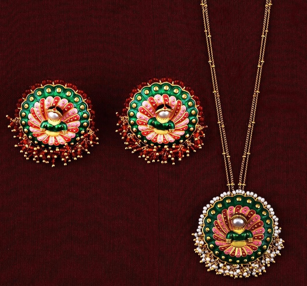 Buy Amrapali multicolor enamel gold plated pendent set online in USA with earrings. Buy beautiful gold plated jewelry, gold plated earrings, silver earrings, silver bangles, bridal jewelry, wedding jewellery from Pure Elegance Indian fashion store in USA.-full view