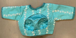 Buy pastel blue saree blouse online in USA with white thread embroidery. Elevate your saree style with exquisite readymade saree blouses, embroidered saree blouses, Banarasi sari blouse, designer sari blouse, choli-cut blouse, corset blouses from Pure Elegance Indian fashion store in USA.-back