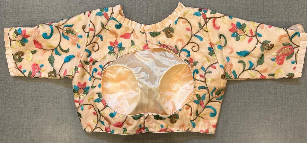 Buy peach saree blouse online in USA with multicolor floral embroidery. Elevate your saree style with exquisite readymade saree blouses, embroidered saree blouses, Banarasi sari blouse, designer sari blouse, choli-cut blouse, corset blouses from Pure Elegance Indian fashion store in USA.-back