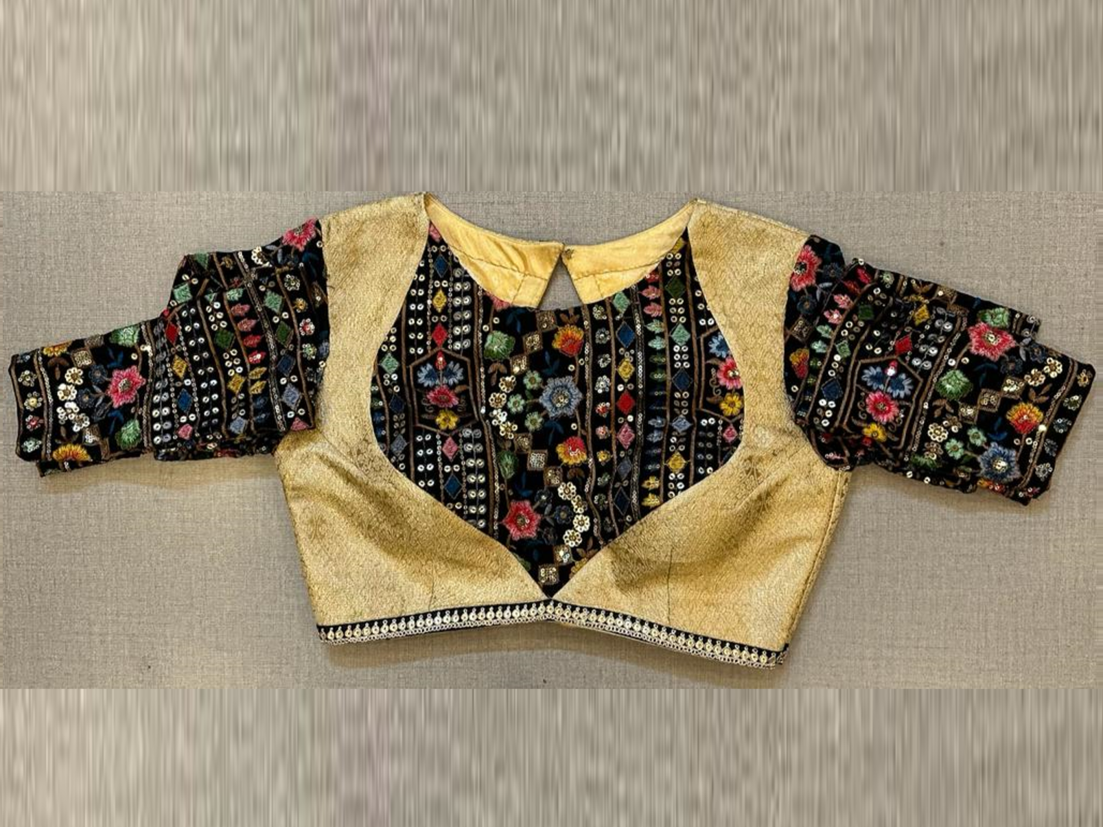 Shop golden and black multicolor embroidery saree blouse online in USA. Elevate your saree style with exquisite readymade saree blouses, embroidered saree blouses, Banarasi sari blouse, designer sari blouse, choli-cut blouse, corset blouses from Pure Elegance Indian fashion store in USA.-full view