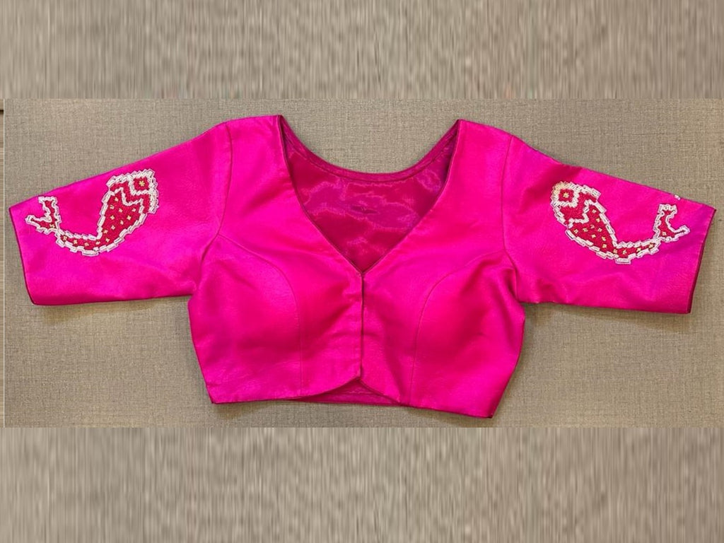 Buy beautiful bright pink hand embroidered saree blouse online in USA. Elevate your saree style with exquisite readymade sari blouses, embroidered saree blouses, Banarasi sari blouse, designer saree blouse, choli-cut blouses, corset blouses from Pure Elegance Indian fashion store in USA.-full view