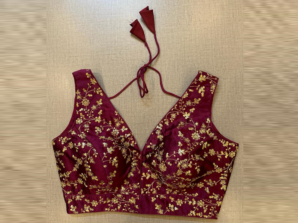 Buy dark magenta sleeveless saree blouse online in USA with sequin embroidery. Elevate your saree style with exquisite readymade sari blouses, embroidered saree blouses, Banarasi sari blouse, designer saree blouse, choli-cut blouses, corset blouses from Pure Elegance Indian fashion store in USA.-full view