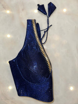 Buy navy blue sequin saree blouse online in USA with sequin lace. Elevate your saree style with exquisite readymade sari blouses, embroidered saree blouses, Banarasi sari blouse, designer saree blouse, choli-cut blouses, corset blouses from Pure Elegance Indian fashion store in USA.-side