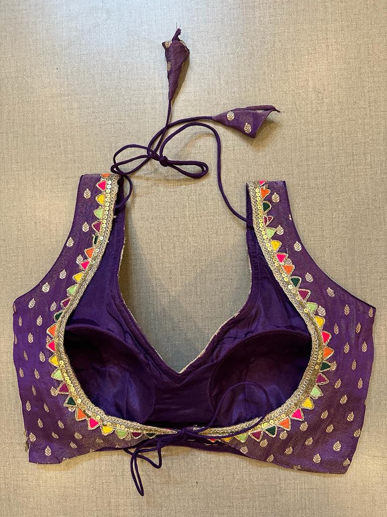 Buy purple sleeveless saree blouse online in USA with multicolor lace. Elevate your saree style with exquisite readymade sari blouses, embroidered saree blouses, Banarasi sari blouse, designer saree blouse, choli-cut blouses, corset blouses from Pure Elegance Indian fashion store in USA.-back